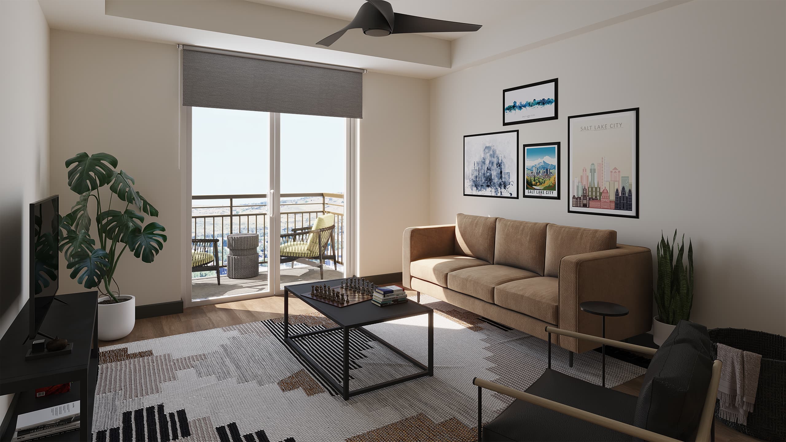 Modern living room with a tan sofa, black coffee table, wall art, large window with balcony access, indoor plants, and a ceiling fan. Light streams in, creating a cozy, welcoming atmosphere.