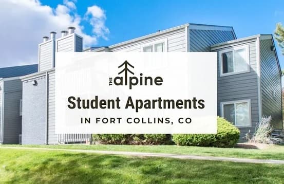 Gray apartment building with white trim surrounded by green grass and bushes under a blue sky. In the foreground, a sign reads The Alpine Apartments Fort Collins, welcoming you to modern student living in the heart of Colorado.