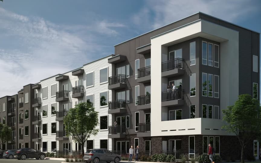 Modern four-story Seasons on Riverdale Apartments Ogden features balconies, large windows, and a mix of white and dark siding. Several cars are parked in front, and a few people are walking near the entrance on a sunny day.