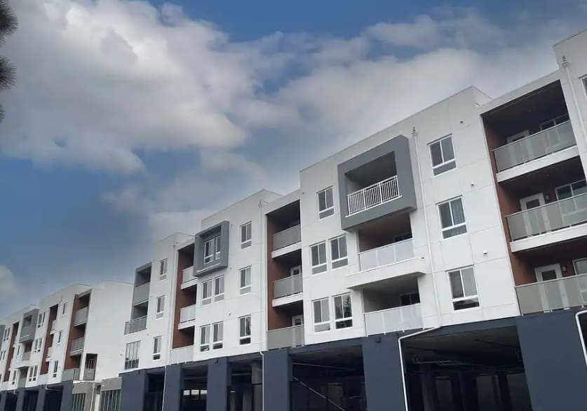 A building with many balconies.