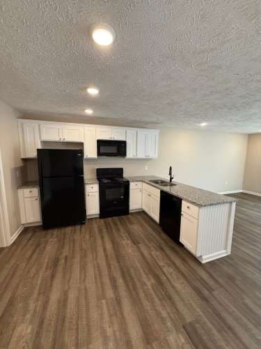 Nestled Tri-Plex in the Heart of Greenfield