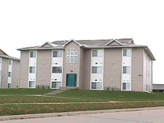 Secured Eastside Iowa City 2 bdrm condo with carport.